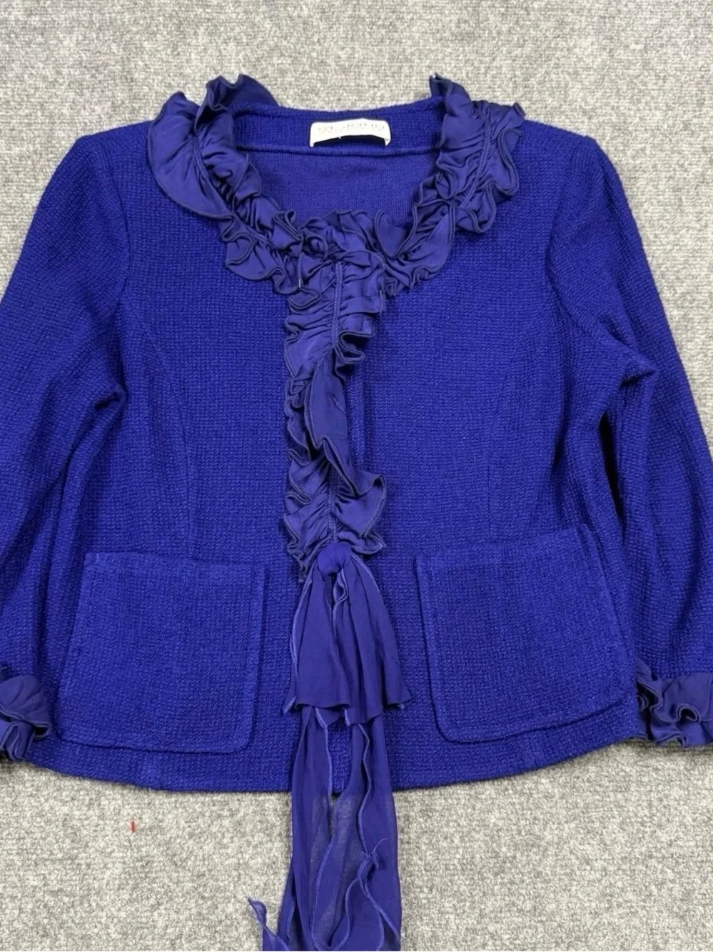 St. John Collection Blue knit skirt suit features a jacket Size 12